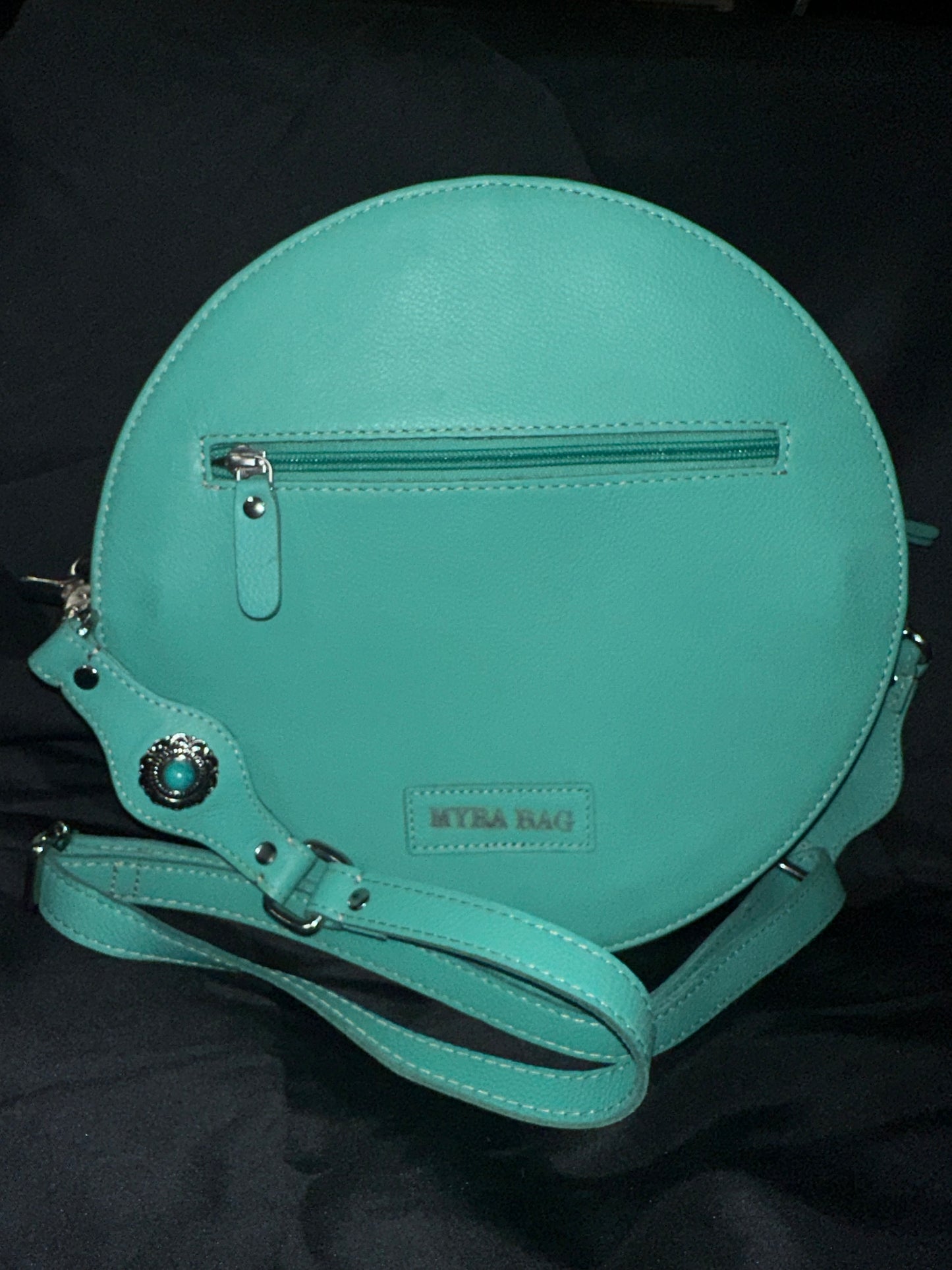 Myra Bag: "WINOKA TRAIL ROUND BAG"