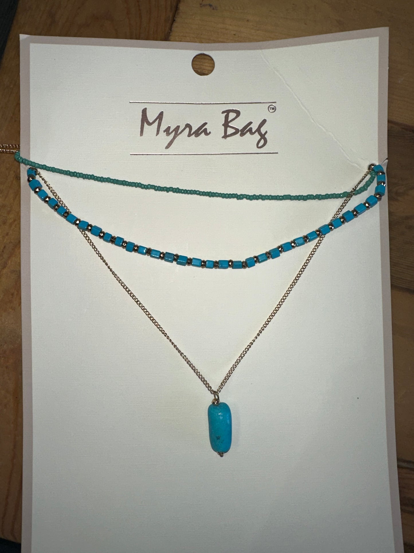 Myra Bag: "PIOUS NECKLACE"